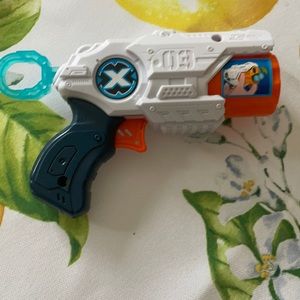 X shot mini fake bullet gun.